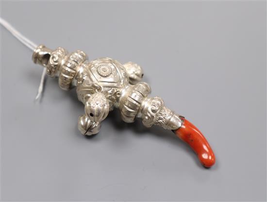 A Victorian silver childs rattle, with three bells, whistle and coral teether, Colen Hewer Cheshire, Birmingham, 1879, 10.2cm.